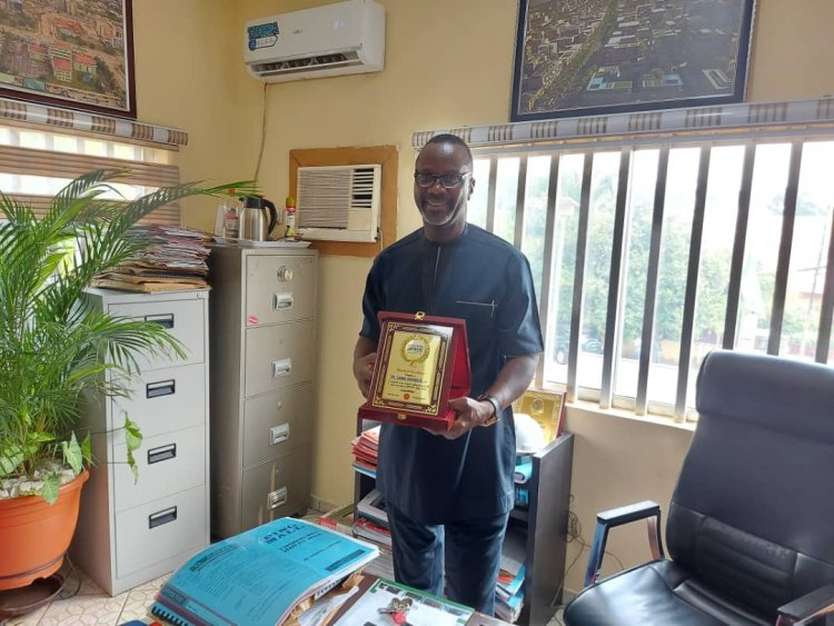 DODC Ag. Director received award of Excellence